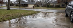 Water Running Across the Driveway or Path Instead of Draining Away: What’s Gone Wrong